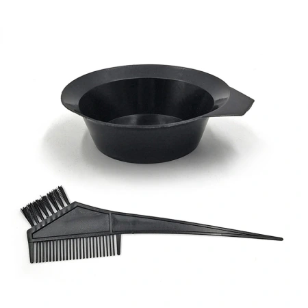 Hair dyeing tools in a hair salon: hair dyeing combs, perming and dyeing supplies, hair dyeing brushes, oil baking bowls, dye pastes, and small black color-mixing bowls Hair dyeing tools in a hair salon: hair dyeing combs, perming and dyeing supplies, hair dyeing brushes, oil baking bowls, dye pastes, and small black color-mixing bowls